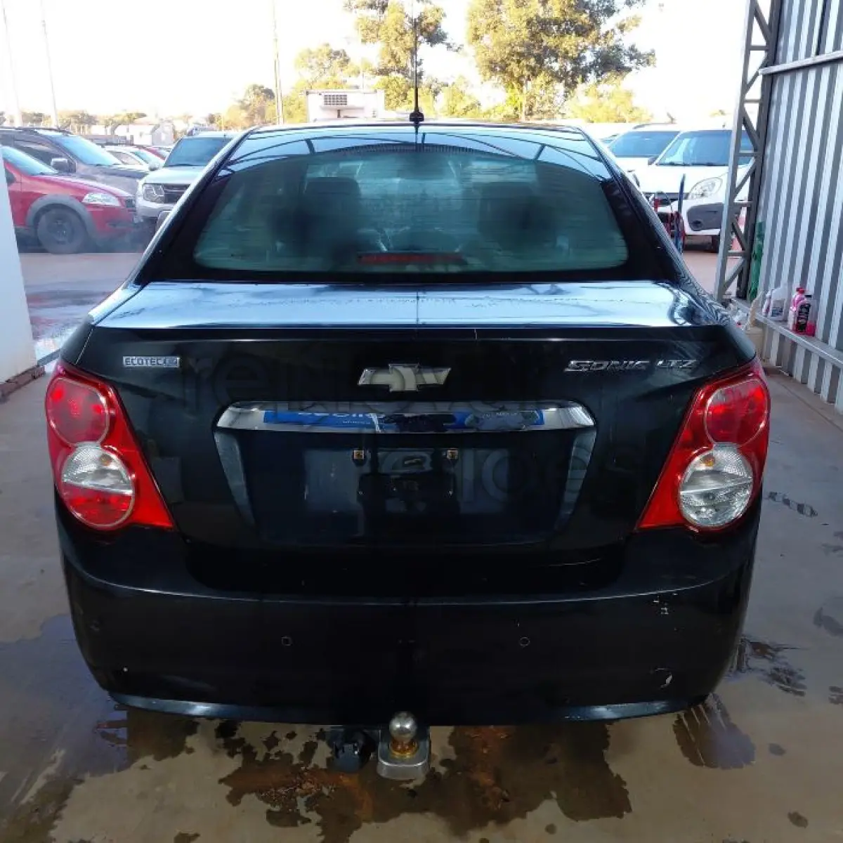LOTE 005 - CHEVROLET SONIC LTZ NB AT - ANO 2013/2013 - COMPLETO -  SICREDI INTERESTADOS - INDÍCIO  DE SINISTRO E PASSAGEM POR LEILÃO