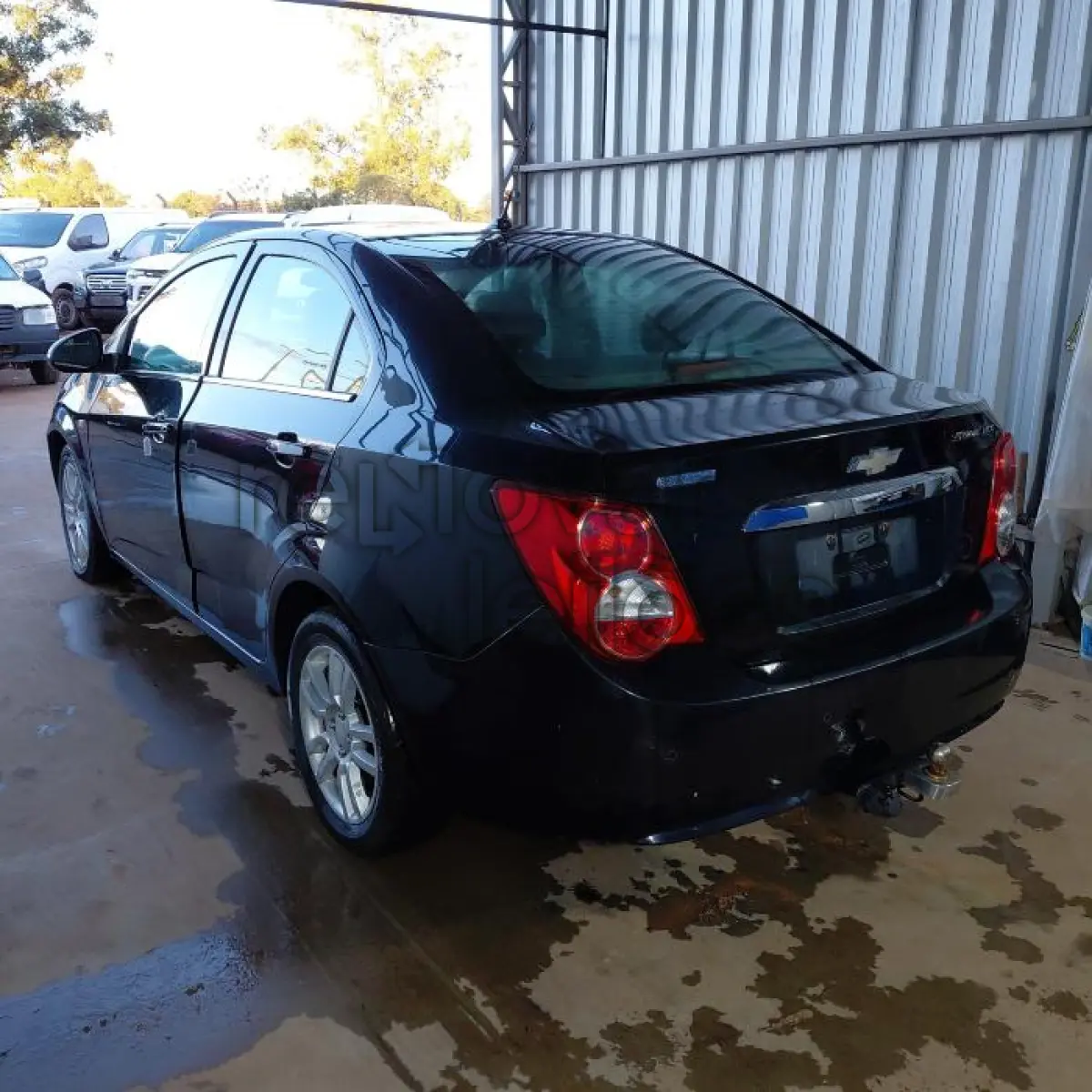 LOTE 005 - CHEVROLET SONIC LTZ NB AT - ANO 2013/2013 - COMPLETO -  SICREDI INTERESTADOS - INDÍCIO  DE SINISTRO E PASSAGEM POR LEILÃO