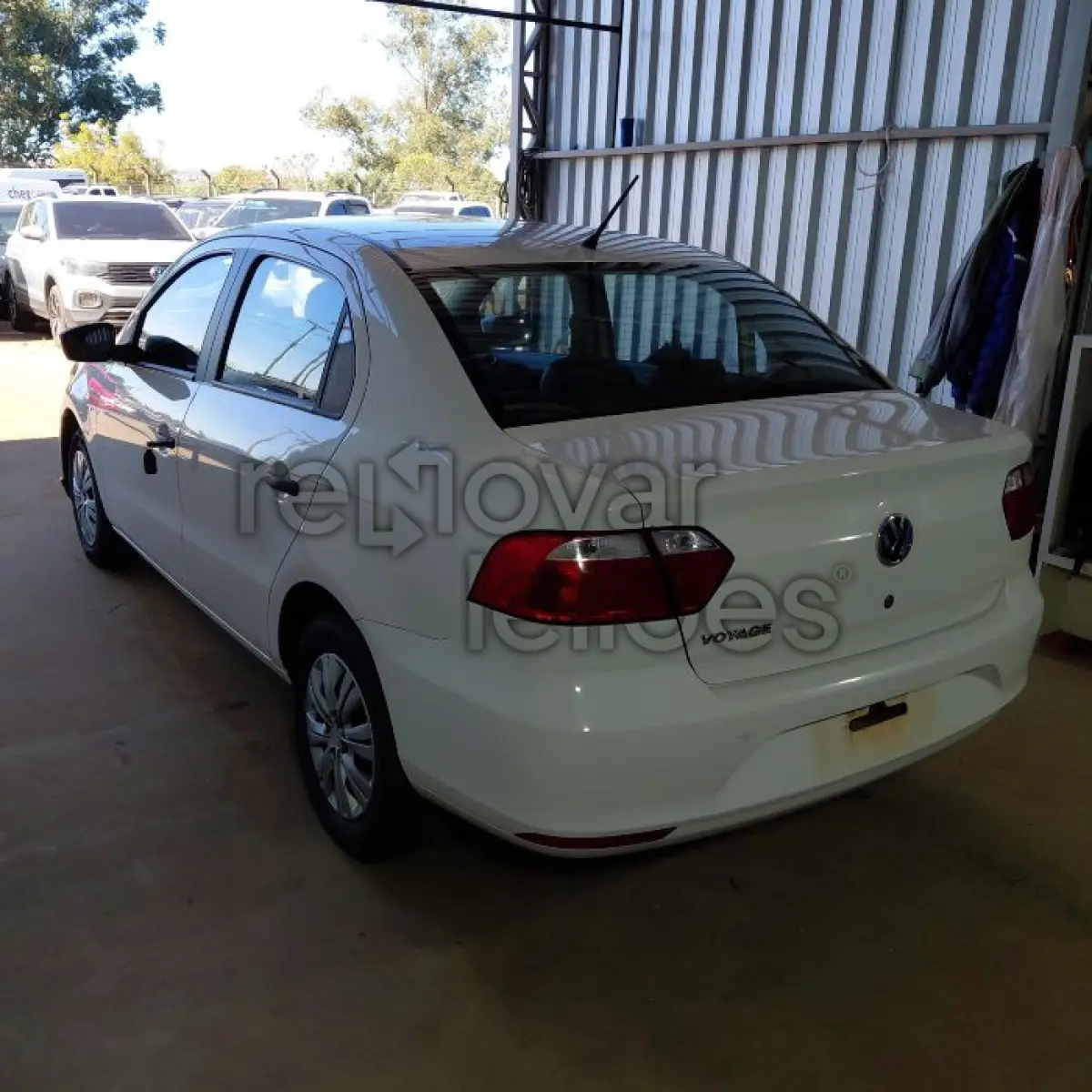 LOTE 019 - VOLKSWAGEN VOYAGE - ANO 2021/2022 - COMPLETO - SICOOB CREDITAIPU - DEPOSITADO EM SANTO ÂNGELO/RS
